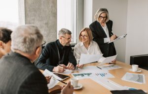 business people having meeting Leadership Styles Exploring Different Approaches and Their Impact body