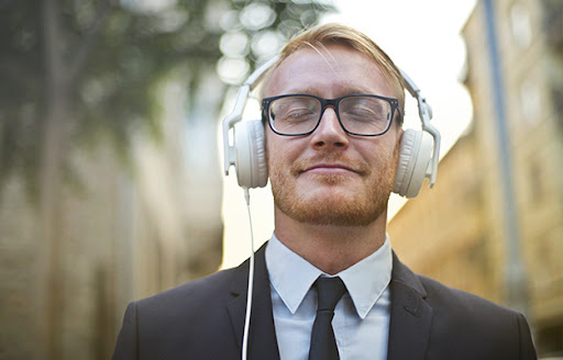 guy listening to music The Power of Positivity How a Positive Mindset Can Transform Your Business body granger whitelaw